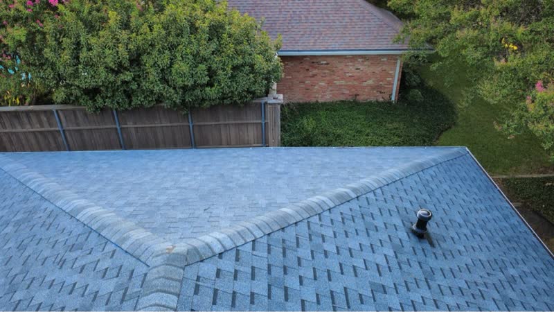 After photo 1 — Dallas green-to-grey roof replacement