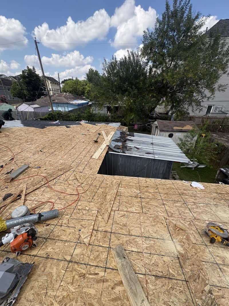 During photo 2 — Houston roof repair turned replacement
